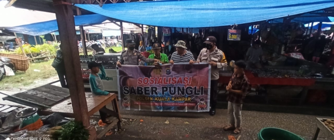 Polsek Kuala Kampar Sosialisasi Saber Pungli di Pasar