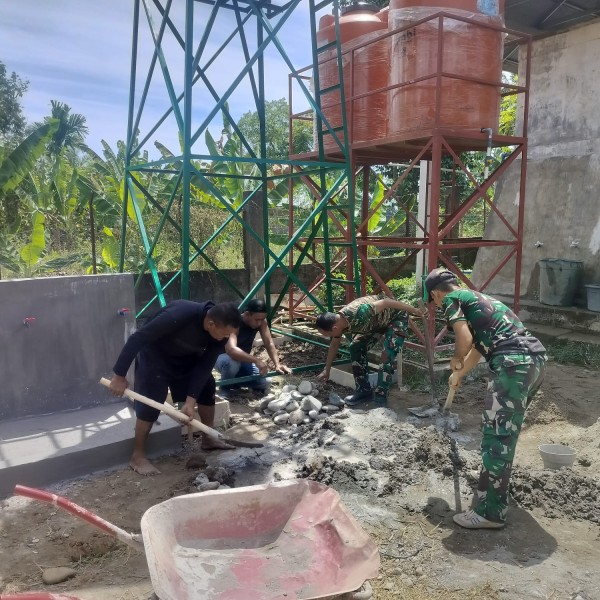 Pengecoran Tiang Tandon Air TMMD ke-129 di Blang Cot Dikerjakan Satgas dan Warga