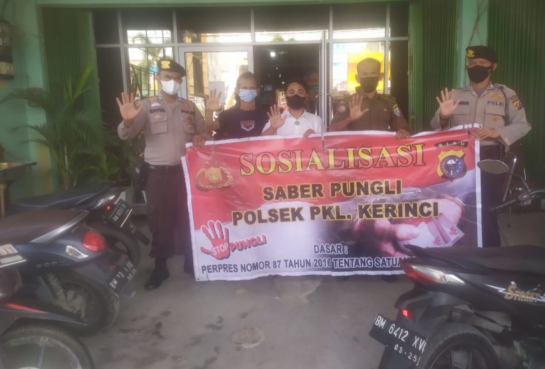 Polsek Pangkalan Kerinci Sosialisasi Saberpungli di Beberapa Tempat