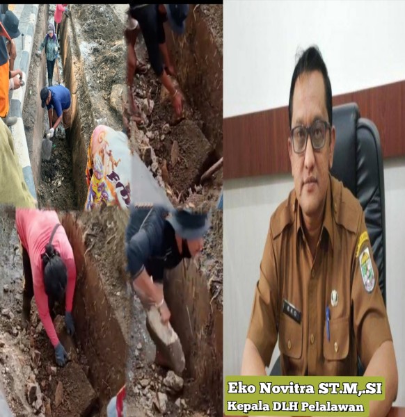 Solusi Tepat,Kepala DLH Pelalawan Bersama Tim Atasi Banjir Dengan  Pembersihan Drainase .
